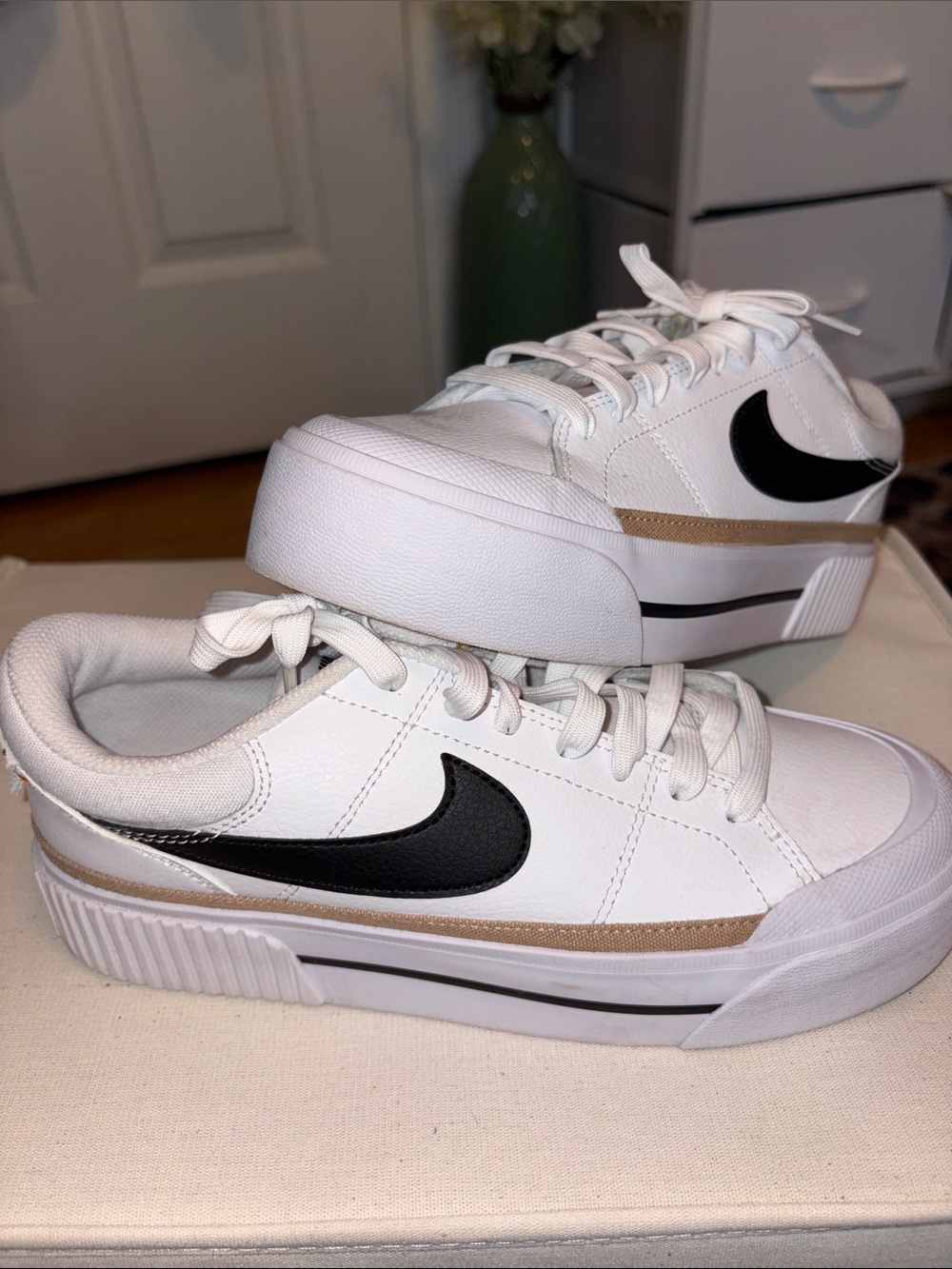 Nike women’s court legacy White Low-Top Sneakers with Black Swoosh Accent